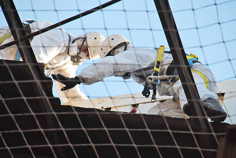 Arbeiter in Schutzausrüstung